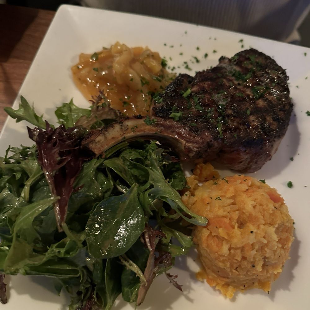 The Creek House Grill - Pork chop with apple mint chutney, parsnips and carrots mash, and dressed greens. 100000/10!!! So good! Would return for this dish alone - American Near Me - Callicoon, New York The Creek House Grill - Pork chop with apple mint chutney, parsnips and carrots mash, and dressed greens. 100000/10!!! So good! Would return for this dish alone - American Near Me - Callicoon, New York