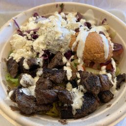 Steak bowl with saffron rice. Steak bowl with saffron rice.