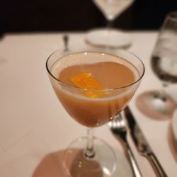 Peterson's - Pit Stop  Herradura Tequila, brown sugar peach syrup, hot honey, lemon, condensed milk