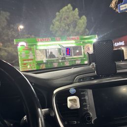 Taco truck in gas station lot Taco truck in gas station lot