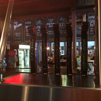 7 Seas Brewing - Main bar, left side with tap system view - Breweries Near Me - Gig Harbor, Washington