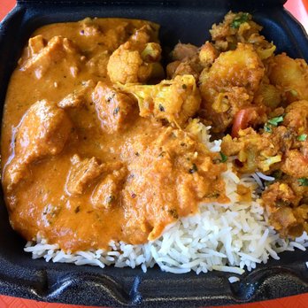 Curry Hut - Two Item Combo: Chicken Tikka Masala (left) and Potatoes and Cauliflower (Garlic Naan not pictured) - Indian Near Me - La Mirada, California Curry Hut - Two Item Combo: Chicken Tikka Masala (left) and Potatoes and Cauliflower (Garlic Naan not pictured) - Indian Near Me - La Mirada, California