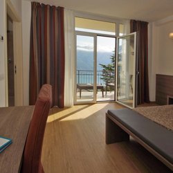Village Hotel Lucia - A bedroom in Village Hotel Lucia