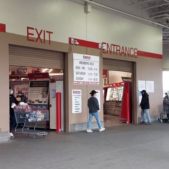 Costco - Hours listed in photo.  Taken image December 2021 - Wholesale Stores Near Me - Aloha, Oregon