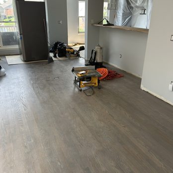 Faith Floors - This floor was apparently done while working in kitchen. Installer didn't care to protect the floor or even think to cut outside. - Flooring Near Me - Newport, Kentucky Faith Floors - This floor was apparently done while working in kitchen. Installer didn't care to protect the floor or even think to cut outside. - Flooring Near Me - Newport, Kentucky