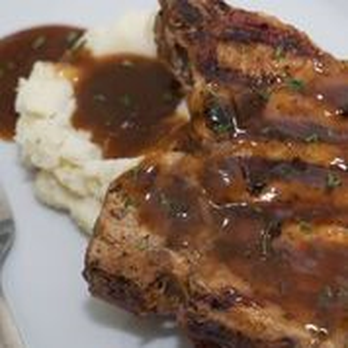 Southern Creations - Smothered Pork Chops - Caterers Near Me Southern Creations - Smothered Pork Chops - Caterers Near Me
