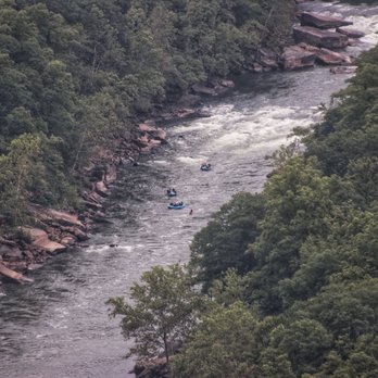 New River Gorge Bridge - Rafters in the New River - Landmarks & Historical Buildings Near Me - Fayetteville, West Virginia New River Gorge Bridge - Rafters in the New River - Landmarks & Historical Buildings Near Me - Fayetteville, West Virginia