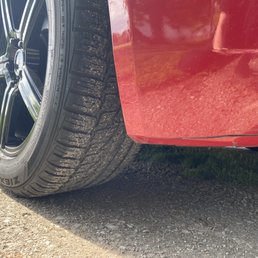 The scratch that was not there before. As only had the car almost a week and are other photo does not have it there.