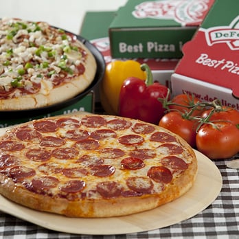 DeFelice Bros Pizza - two pizzas on a table - Pizza Near Me - Follansbee, West Virginia DeFelice Bros Pizza - two pizzas on a table - Pizza Near Me - Follansbee, West Virginia