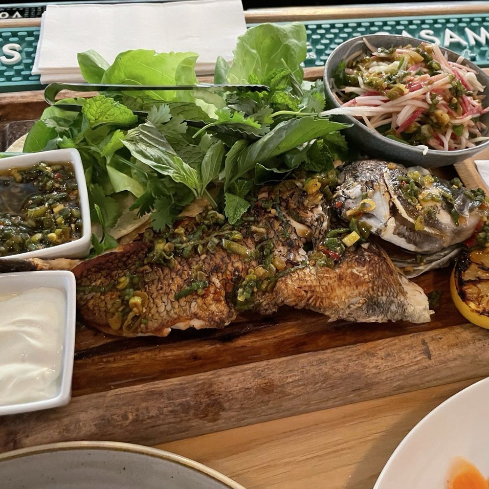Whole snapper / salsas / herbs / grilled lemon Whole snapper / salsas / herbs / grilled lemon