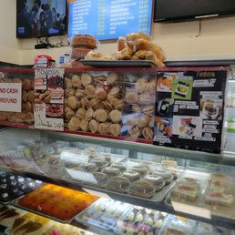 a variety of pastries on display a variety of pastries on display