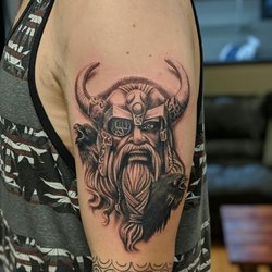 Uplifted Tattoo