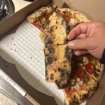 Pizzeria Nomad - Burnt pizza. - Pizza Near Me - Amarillo, Texas Pizzeria Nomad - Burnt pizza. - Pizza Near Me - Amarillo, Texas