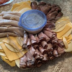 Totaro's - Deli tray with ham, turkey and roast beef. Cheese are American and Provolone