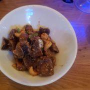 Photo of Blue Ocean Robata & Sushi Bar - Carlsbad, CA, United States. Caramelized roasted eggplant with cashews and sesame seeds.THE BEST!