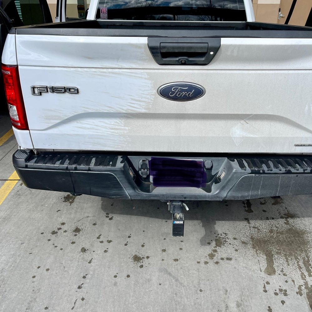 Rear of my truck after driving thru twice. The second time I told the attendant that my tailgate was Not even touched the first time Rear of my truck after driving thru twice. The second time I told the attendant that my tailgate was Not even touched the first time