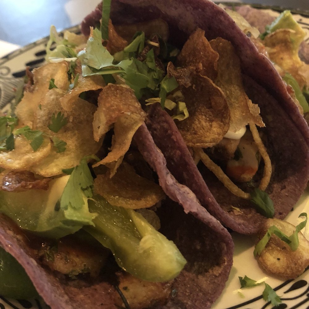 Barrio - Grilled octopus tacos are tasty. Potato chips add a nice crunch. - Mexican Near Me - Chicago, Illinois Barrio - Grilled octopus tacos are tasty. Potato chips add a nice crunch. - Mexican Near Me - Chicago, Illinois