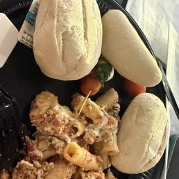 Nasty mushy ziti and uncooked rolls