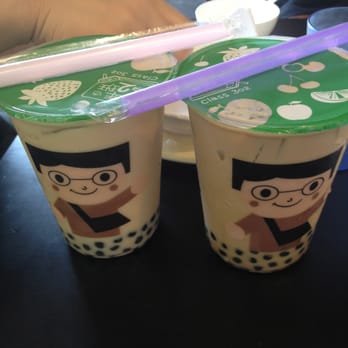 Class 302 Cafe - Jasmine Milk Tea (Left), Regular Milk Tea (Right). Both are the large size. - Taiwanese Near Me - Cerritos, California Class 302 Cafe - Jasmine Milk Tea (Left), Regular Milk Tea (Right). Both are the large size. - Taiwanese Near Me - Cerritos, California