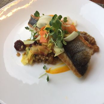 Riverpark - Crispy Black Sea bass w/ wheat berries, white raisins and carrot purée - New American Near Me - New York, New York Riverpark - Crispy Black Sea bass w/ wheat berries, white raisins and carrot purée - New American Near Me - New York, New York