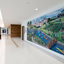 Photo of Ascension Dell Seton Medical Center at The University of Texas - Austin, TX, US. 'A Healthier Austin' mural was created with artwork from school children, Seton associates, support from H-E-B and many community members.