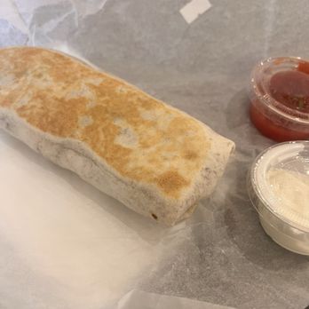 Hardy Coffee - Loaded breakfast burrito with a side of salsa and sour cream - Coffee & Tea Near Me - Omaha, Nebraska Hardy Coffee - Loaded breakfast burrito with a side of salsa and sour cream - Coffee & Tea Near Me - Omaha, Nebraska