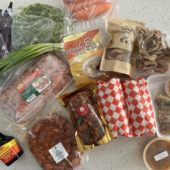 Lao Market - trust me you NEED to try the crunchy snack thing in the gold and clear packaging. ps: some of the items pictured were from banh mi ba le - International Grocery Near Me - Oakland, California