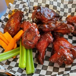 Hickory Smoked wings with honey bbq sauce. Huge meaty wings. Yum.