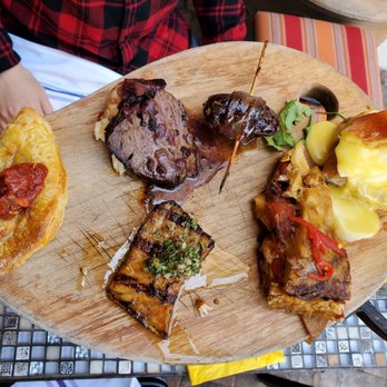 Cafe Sevilla - Brunch sampler: empanada, filet mignon, grilled fish, bacon wrapped date, egg Benedict. - Spanish Near Me - Costa Mesa, California Cafe Sevilla - Brunch sampler: empanada, filet mignon, grilled fish, bacon wrapped date, egg Benedict. - Spanish Near Me - Costa Mesa, California