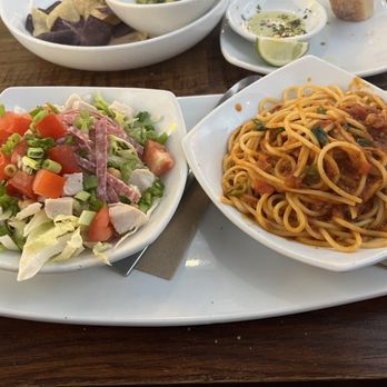 California Pizza Kitchen - Bolognese spaghetti and Italian salad - Pizza Near Me - Bakersfield, California California Pizza Kitchen - Bolognese spaghetti and Italian salad - Pizza Near Me - Bakersfield, California