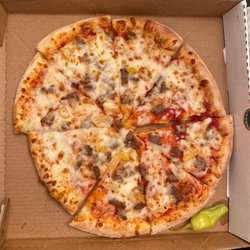 Papa Johns Pizza - Beef and Pineapple (Custom) pizza. As you can see not a lot of toppings and pretty unappetizing to look at.