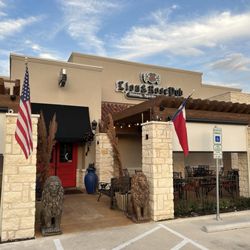 The Lion & Rose Restaurant & Pub - Front with patio on both sides