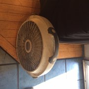 Photo of Zara Afghan Cuisine - Sacramento, CA, United States. Dusty/dirty fan blowing into the restaurant