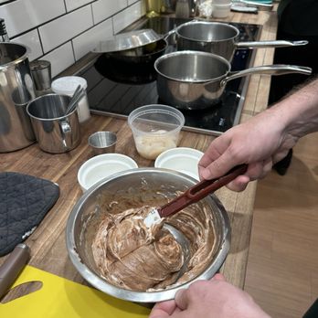 JAX Cooking Studio - Folding the chocolate mousse - Cooking Classes Near Me - Jacksonville, Florida