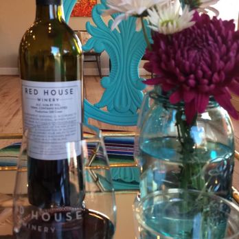 Red House Winery - a glass of wine and a bottle of wine - Wineries Near Me - Nacogdoches, Texas