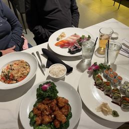 Drunken Noodles, Kung Pao Chicken, Sushi Rolls and Sashimi plate. Drunken Noodles, Kung Pao Chicken, Sushi Rolls and Sashimi plate.