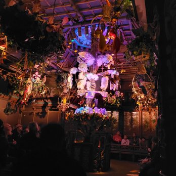 Enchanted Tiki Room - Show ending. Their trick is to make us stand up, face the door, and make us...disappear!!! - Amusement Parks Near Me - Anaheim, California