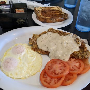 Rutherford's 66 Diner - Country fried steak with over easy eggs, tomatoes, and rye bread - Diners Near Me - Kingman, Arizona Rutherford's 66 Diner - Country fried steak with over easy eggs, tomatoes, and rye bread - Diners Near Me - Kingman, Arizona