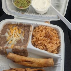 Cielito Lindo - To combo chicken taquitos  with rice and beans, delicious!