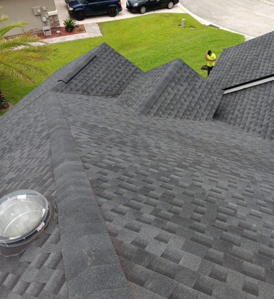 Slide of JCOF Roofing