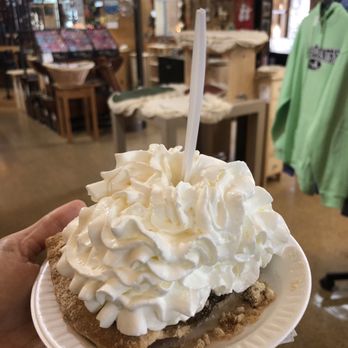 Dutch Haven Shoo-Fly Pie Bakery - A slice of warm shoo fly pie with a mountain of whipped cream for $4 - Bakeries Near Me - Ronks, Pennsylvania