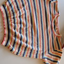 MOD Boutique - You can see the how much it shrunk at the bottom of the sweater. It was washed as instructed in cold water and laid flat to dry.