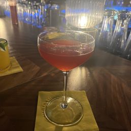 Cranberry, lime, and soda water mocktail.