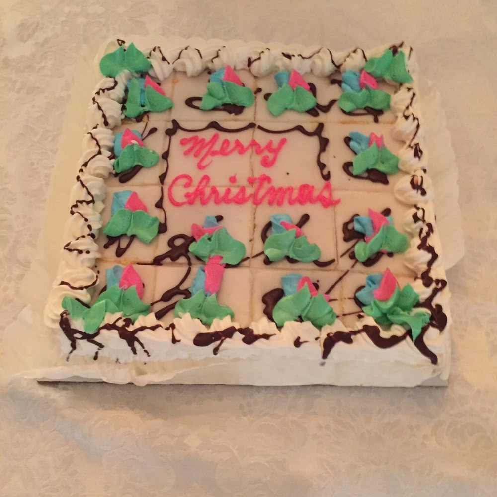 a decorated cake on a table a decorated cake on a table