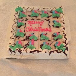 a decorated cake on a table a decorated cake on a table