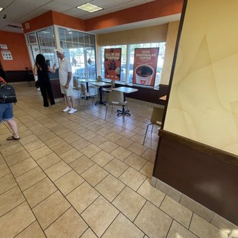 Dunkin' - people in a restaurant waiting for their order - Coffee & Tea Near Me - Wading River, New York Dunkin' - people in a restaurant waiting for their order - Coffee & Tea Near Me - Wading River, New York