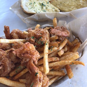 The Crab Shack - Cajun shrimp n fries n a side of garlic bread in the back and i added corn & potatoes - Seafood Near Me - Gardena, California The Crab Shack - Cajun shrimp n fries n a side of garlic bread in the back and i added corn & potatoes - Seafood Near Me - Gardena, California