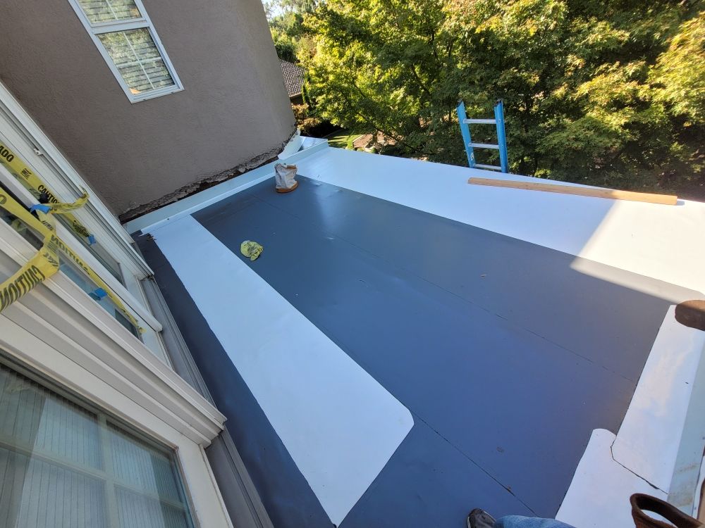 Slide of Custom Roof Crafters