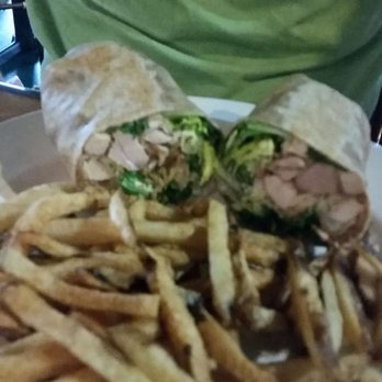 Jerry's Grille - Chicken Cesar wrap with house fries - American Near Me - Jacksonville, Florida Jerry's Grille - Chicken Cesar wrap with house fries - American Near Me - Jacksonville, Florida