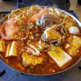 Boiling Point - Hot level beef hot pot. The individual pot with flame is cool. - Taiwanese Near Me - Tukwila, Washington Boiling Point - Hot level beef hot pot. The individual pot with flame is cool. - Taiwanese Near Me - Tukwila, Washington